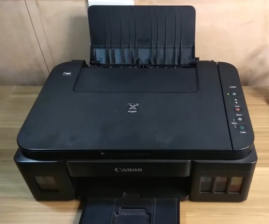 Canon Pixma G2000 front view showing the ink tank system, paper tray and control panel buttons — a common model affected by P07 and 5B00 waste ink absorber errors