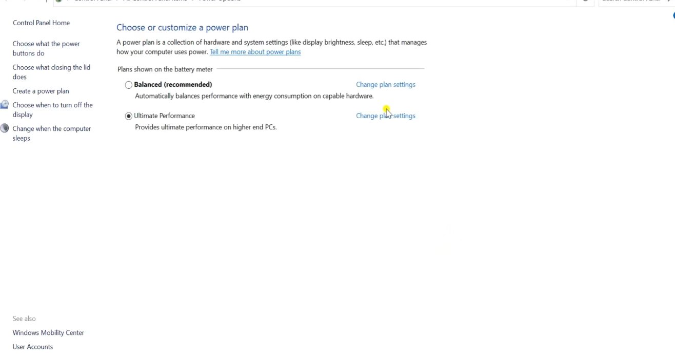 Windows 11 Control Panel showing Power Options with Balanced and Ultimate Performance power plans and Change plan settings links